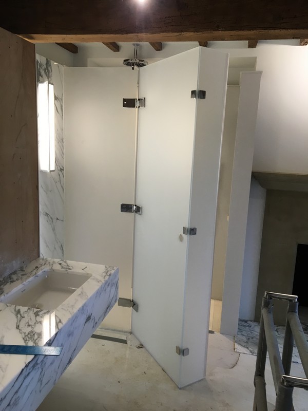 Bespoke frosted glass shower enclosure in South Kensington luxury bathroom