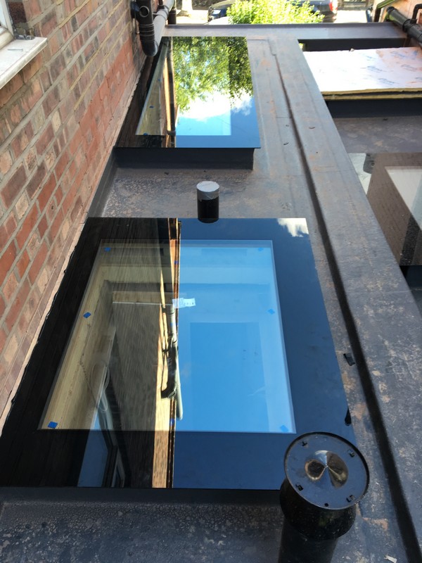 Multiple flat roof skylights on extension in South Kensington